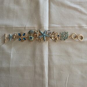 Gold and Blue Sea Life Charm Bracelet